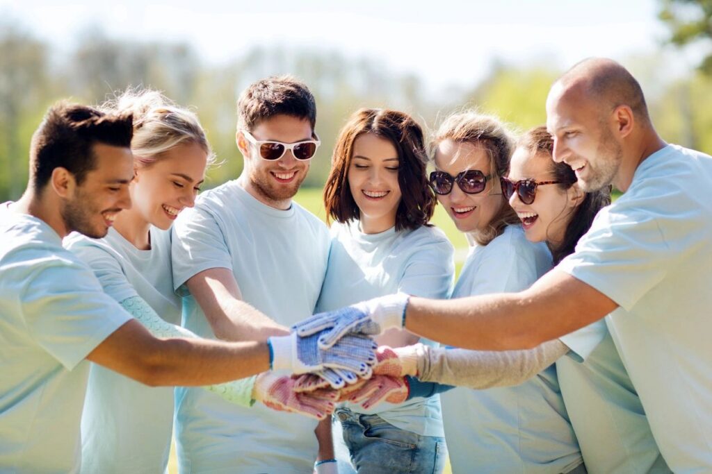 volunteers shaking hands